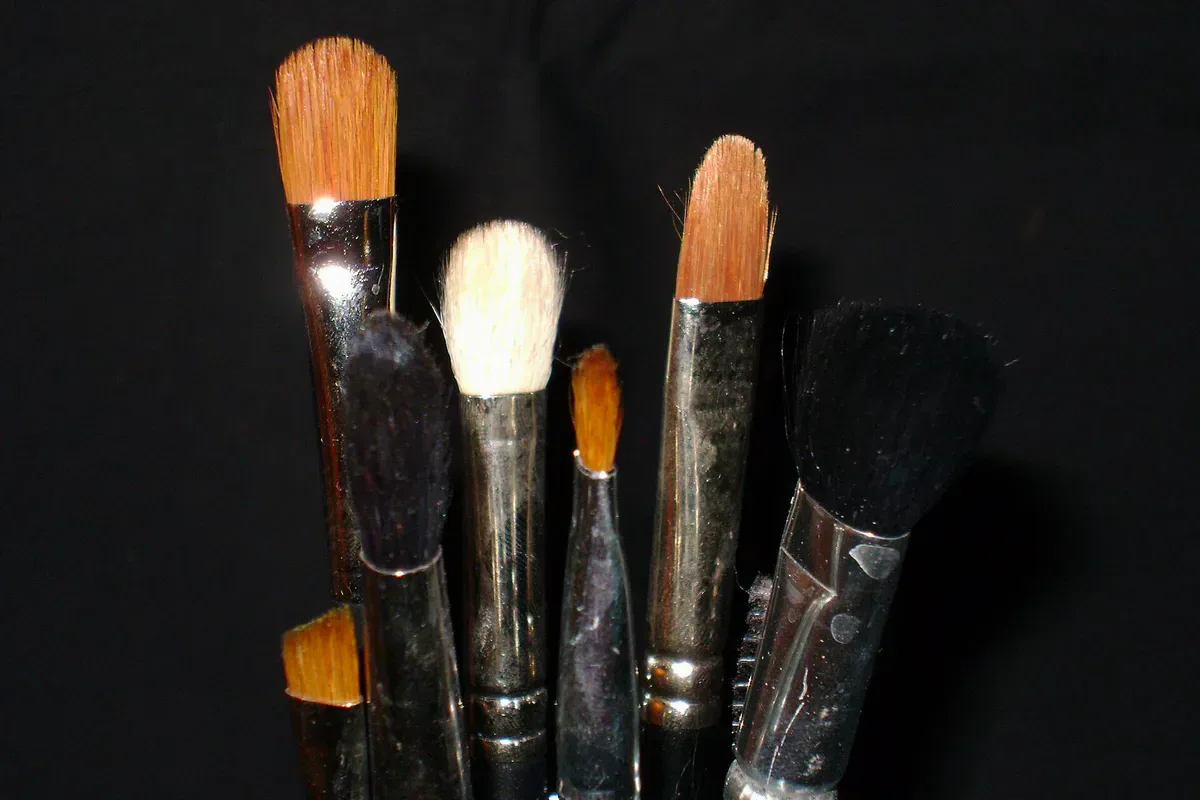 Real-life beauty routine scene for a carry-on makeup bag designed to prevent leaks